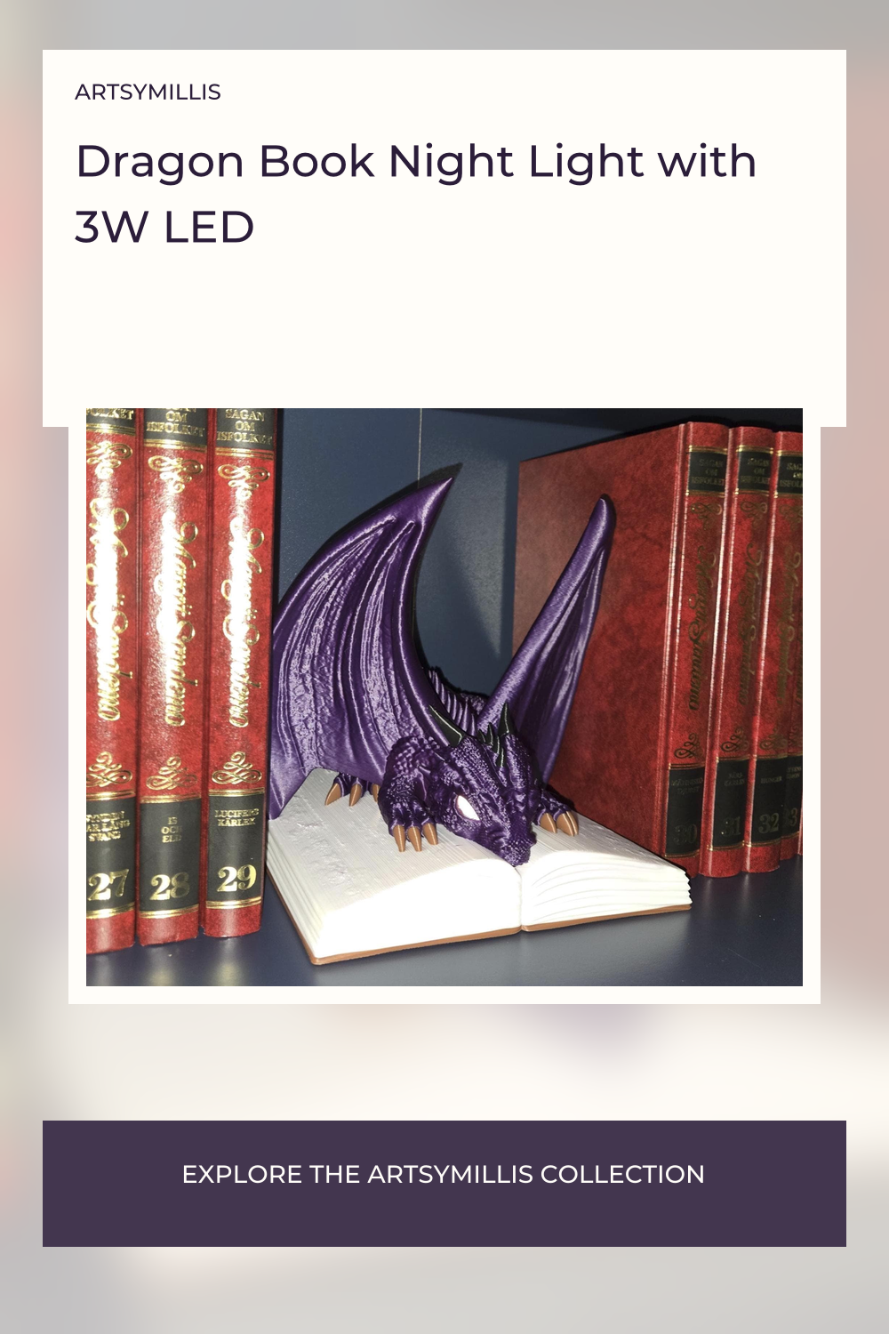 A purple dragon figurine with wings and a tail, positioned on an open book, surrounded by red books with gold lettering.