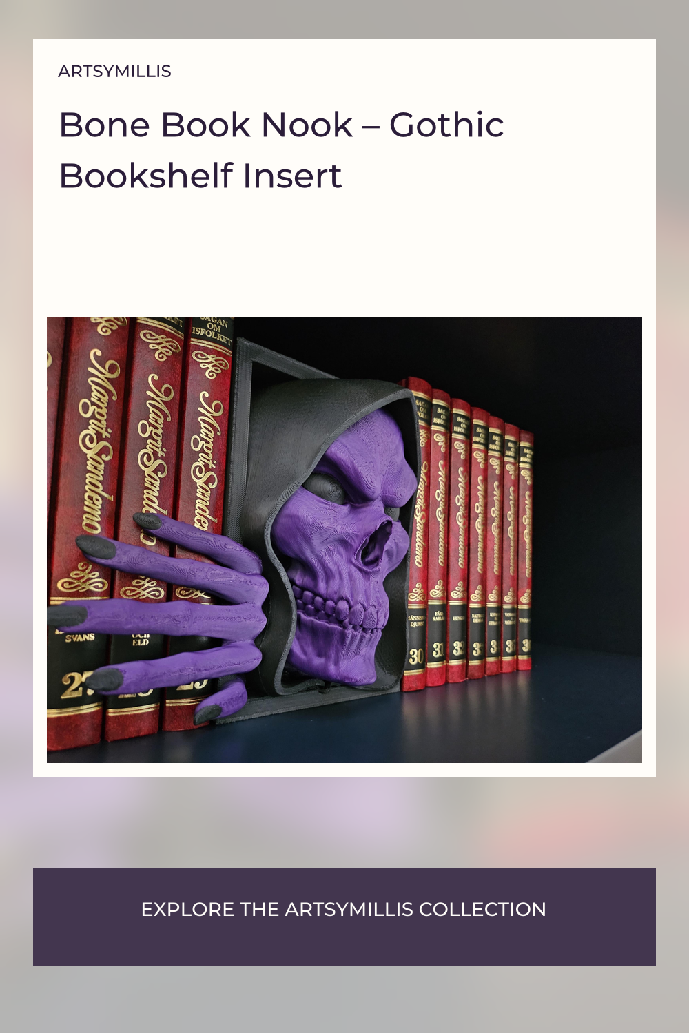 A purple skull with a black hood and a black hand with black fingernails, placed on a shelf with red books.
