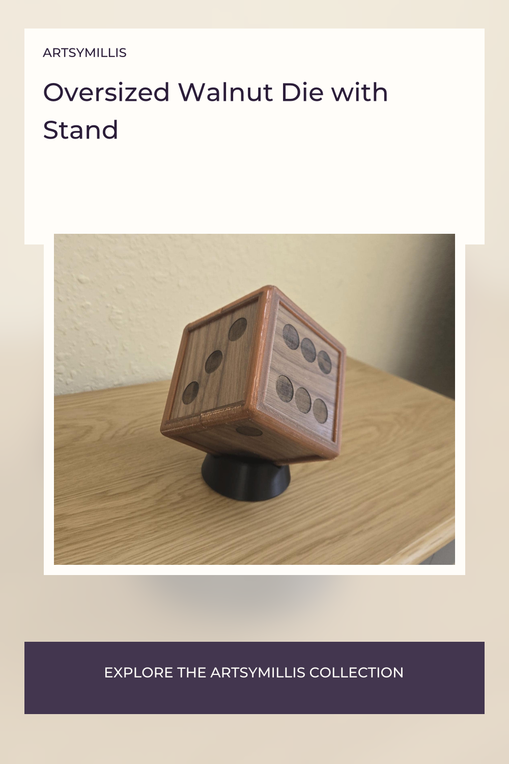 A large, wooden die with black pips, placed on a black stand, sitting on a wooden surface.
