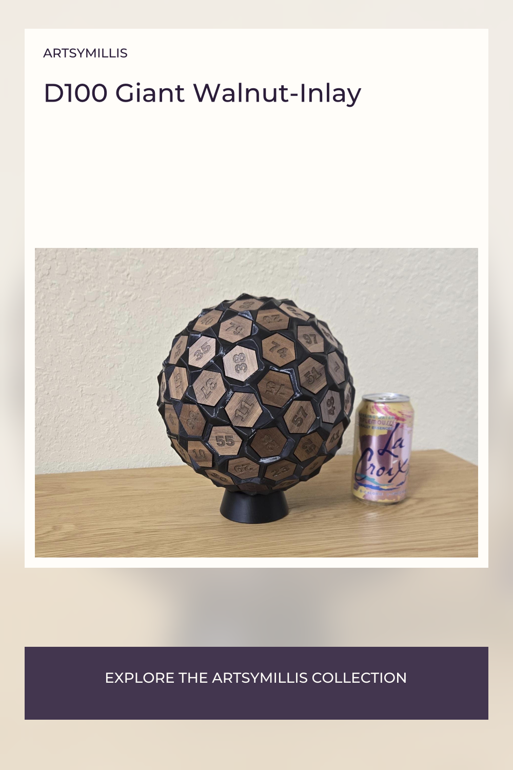 A large, black and brown hexagonal die with numbers on each face, placed on a wooden surface next to a LaCroix can.